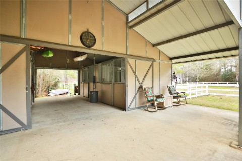 This covered area is the perfect place to sit and enjoy the outdoors.