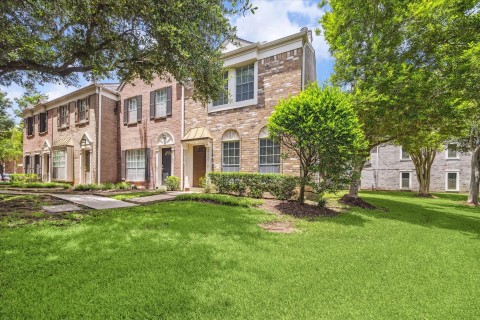 Beautiful townhome on corner lot surrounded by beautiful greenspace.