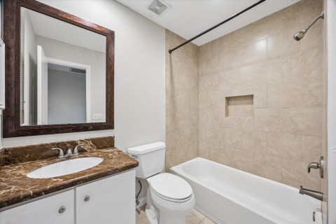 The hall bath is pristine with granite vanity and tub/shower!
