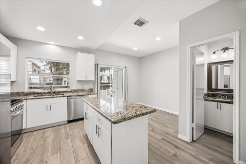 Another view of kitchen to dining area.