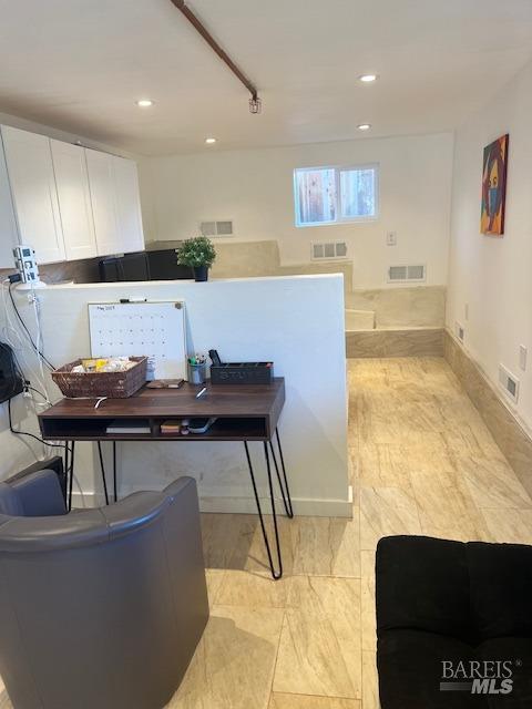 Downstairs area of the guest home. It has a half bath downstairs.