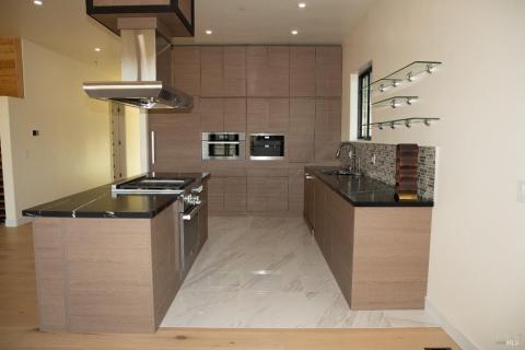 Special flooring and cabinetry in the kitchen area.