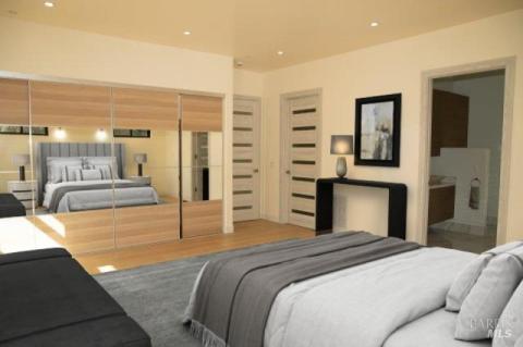 Primary bedroom upstairs with luxurious bathroom.