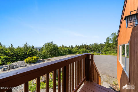 Rear porch off main entryway Rear porch off main entryway