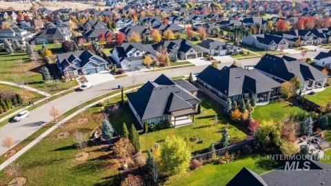 Aerial overview of property's location featuring nearby suburban area
