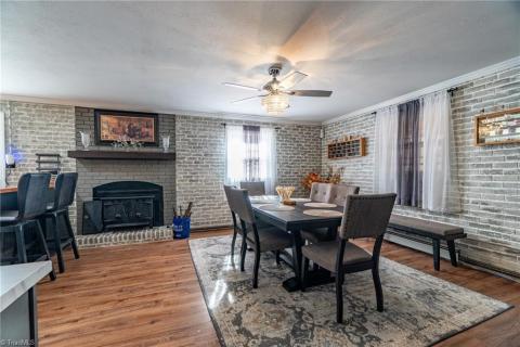 Cozy Wood Burning Fireplace insert in your kitchen/dining area