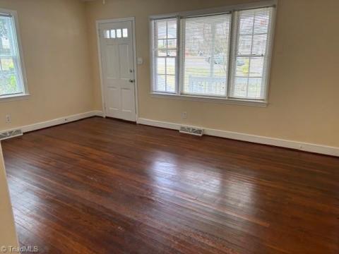 WHEN YOU ENTER THE DARLING FRONT PORCH, YOU ENTER INTO THE LIVING ROOM... ALL FRESHLY PAINTED, BEAUTIFUL ORGINIAL HARDWOOD FLOORS.