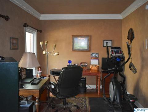 SELLERS USE THIS AS A OFFICE WITH EXERCISE BIKE