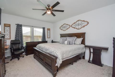 Spacious primary bedroom with ensuite bath.