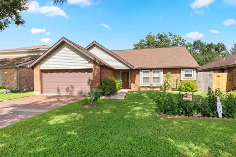 This well maintained 4 bedroom, 2 bath home with gorgeous landscaping is waiting for you!