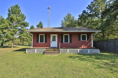 Charming 2 bedroom and 1 bath cottage set amidst a spacious grassy yard and surrounded by mature trees. Ideal for those seeking a peaceful, nature-filled setting. Charming 2 bedroom and 1 bath cottage set amidst a spacious grassy yard and surrounded by mature trees. Ideal for those seeking a peaceful, nature-filled setting.