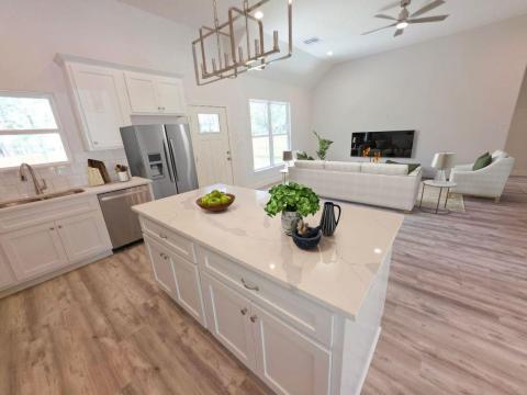 Kitchen featuring appliances with stainless steel