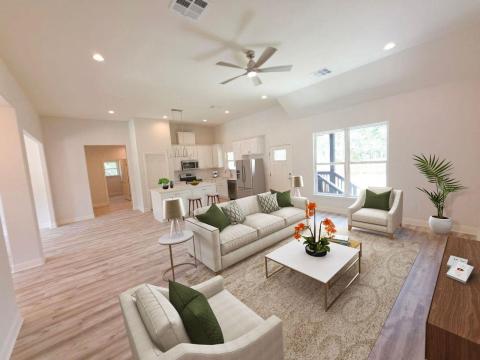 Living area featuring light wood finished floors,