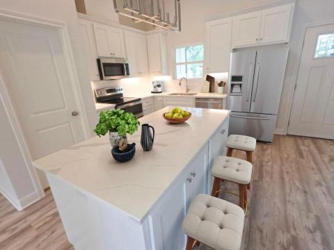 Kitchen with appliances with stainless steel fini