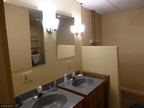 Lower level en suite bath with separate sinks