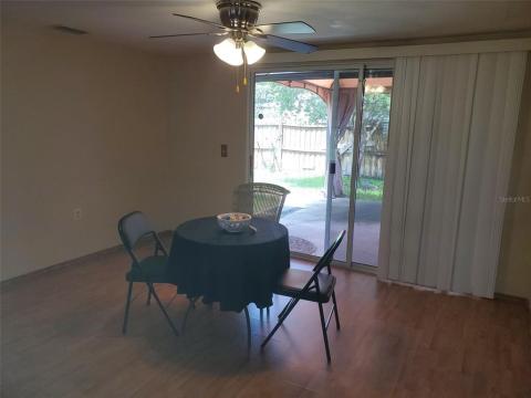 Dining room off the patio that has a covered gazebo.