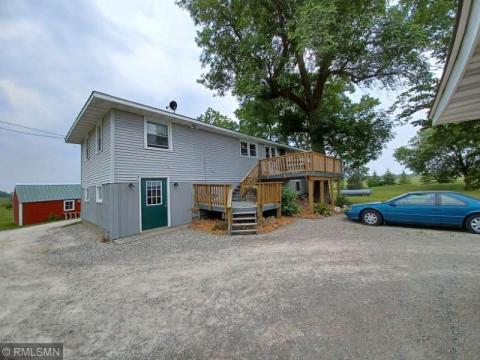 North side of house with two level deck.
