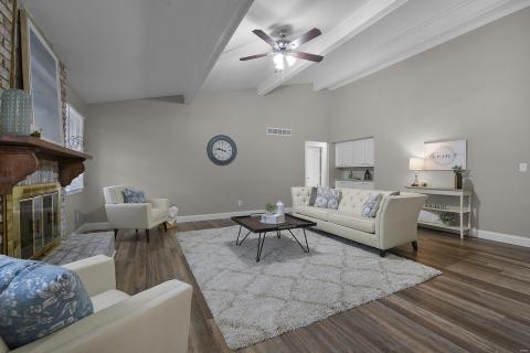 Great Room with fireplace, dry bar off kitchen eating area