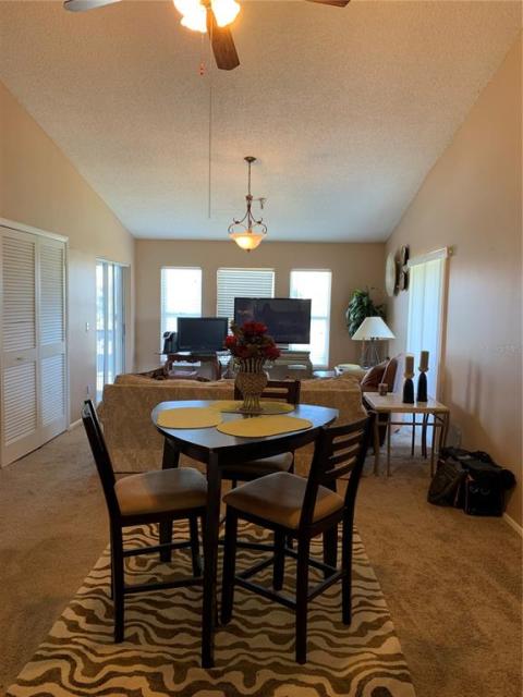 Dining area highlighting the Cathedral ceiling.