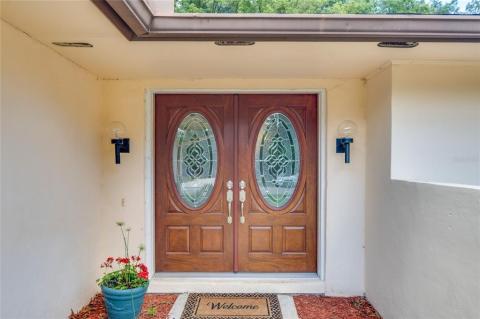 Beautiful Mahogany Woodgrain Oak Wood Fiberglass Impact Double Doors.