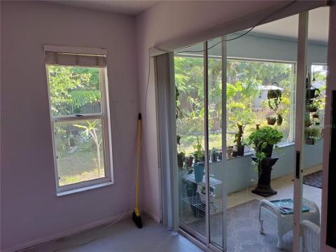 Looking out to the back Lanai from the Bedroom