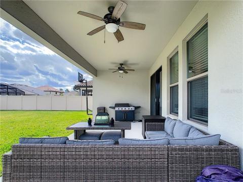 Cozy covered lanai ideal for entertaining family and friends