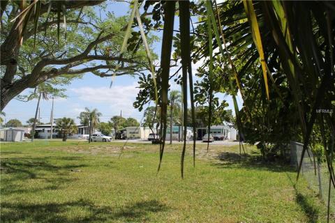 Back south west corner of lot.  Property line is fence.