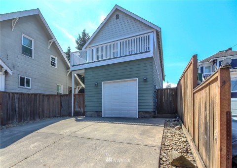 Alley access to large one car garage. Plenty of off street parking. Enough space for a small RV too.