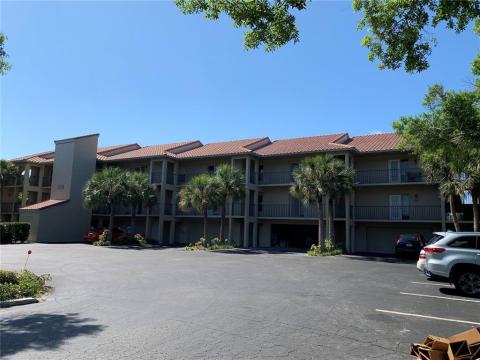 Front of Cartagena (10 units total), each two car garage is shared by the second and third floor owners. Garages have large storage room for each unit.
