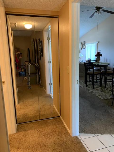 Linen closet outside front bath and front bedroom.  Door to kitchen closes for privacy.