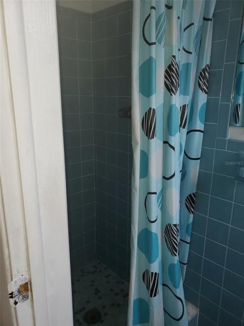 Half Bath with shower in Garage