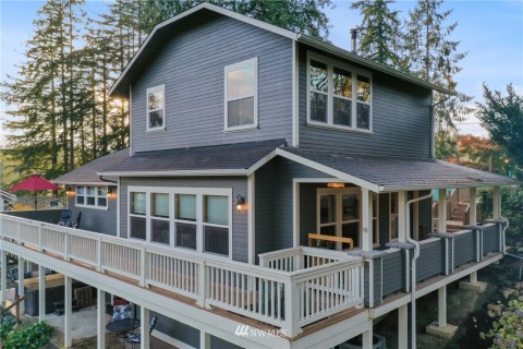 Lakeside view. Home has been freshly painted. Wrap around deck is covered in the front and patio under the deck has been designed to keep you dry while below. Lakeside view. Home has been freshly painted. Wrap around deck is covered in the front and patio under the deck has been designed to keep you dry while below.