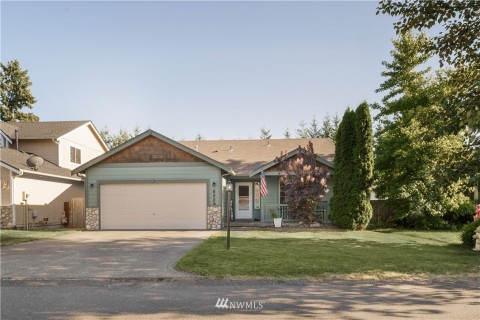 Quaint 1-story rambler style home tucked in the back of the neighborhood away from main traffic. 