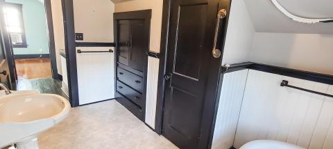 Tons of built-in bathroom/linen storage...