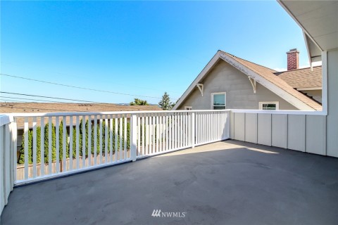 Relax under the stars and enjoy the City Lights & views of Commencement Bay from this gorgeous rear rooftop deck.  