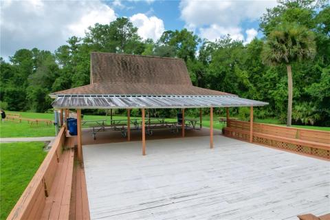 Pavillion and large deck for entertaining or fishing.