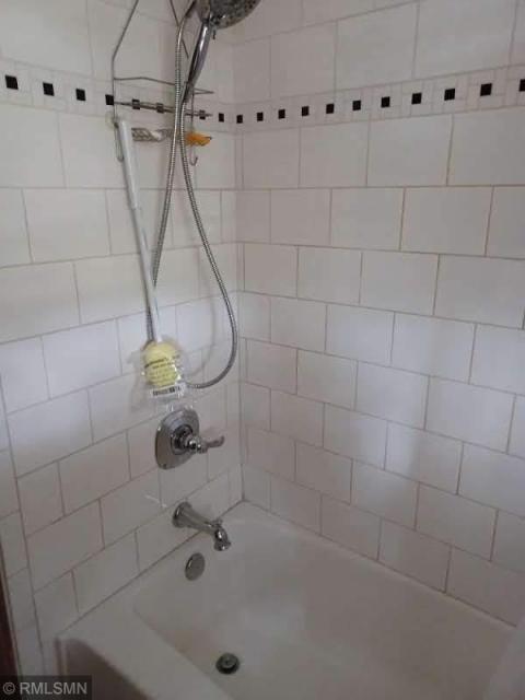 Upper level full bath shower and tub