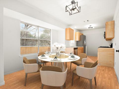 Dining room featuring an inviting chandelier, lig