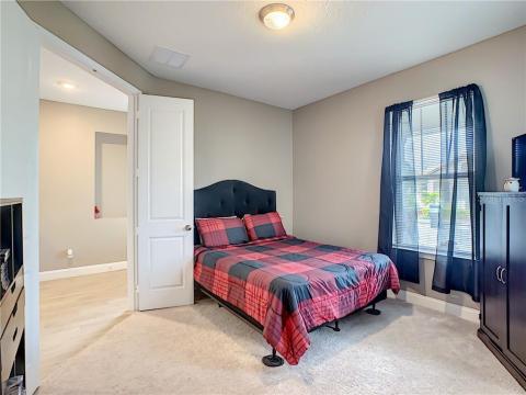 Bedroom #5 with double entry doors (perfect for visiting guests or as an office).