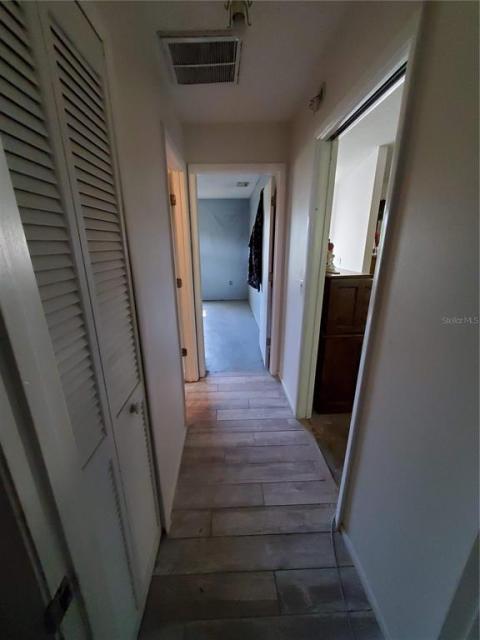 Hallway to the split bedrooms