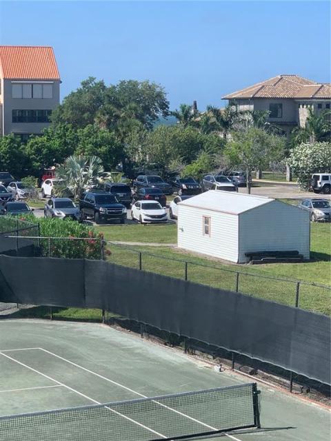 View from lanai of Bradenton Tennis Center and partial bay views.