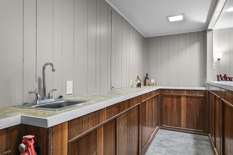 Lower Level wet bar and plenty of storage cabinets