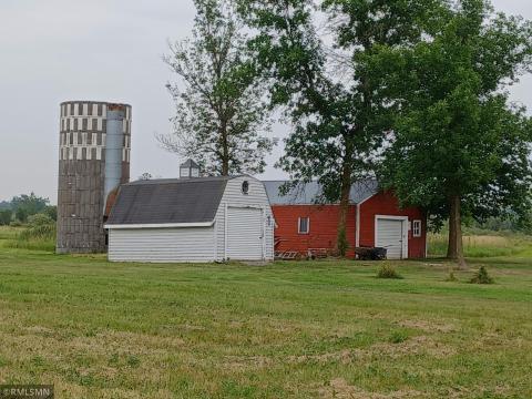 Silo (no roof), shed and small barn.