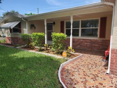 Front entrance with covered porch area.