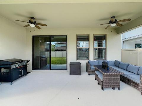 Ample covered lanai with ceiling fans