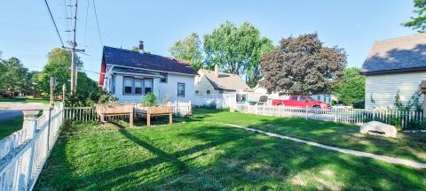 Back yard with picket fence all the way around...